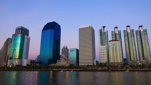 day to night Time-lapse of Bangkok city view at Benjakitti Park, Bangkok, Thailand