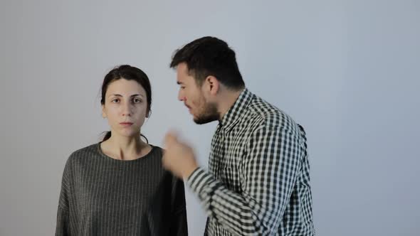 Couple Quarreling on White Background