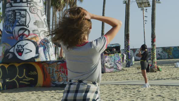 Enthusiastic girl in Venice Beach