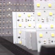 LED-panels in many sizes standing on display on table. Panning shot with focus shift. - VideoHive Item for Sale