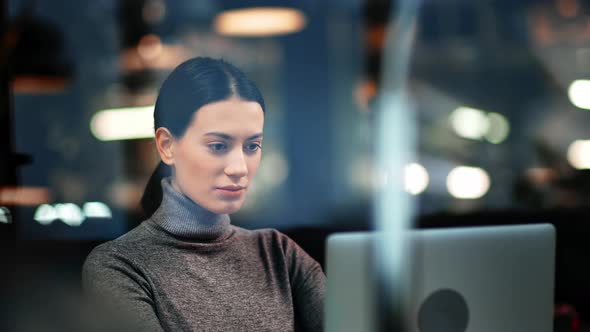 Focused Female Surfing Internet Use Laptop at Cafeteria