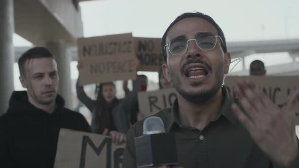 Anchorman Interviewing Wounded Protester