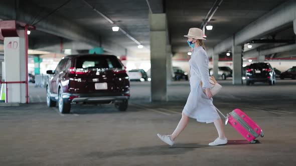 Slow Motion of Fashionable Woman in Colorful Face Mask Traveling During COVID-19