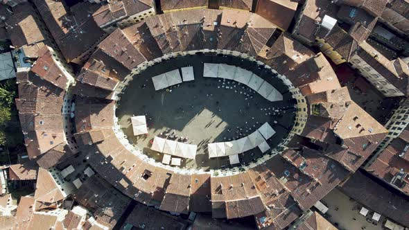 Aerial view of Piazza dell'Anfiteatro in Lucca old town, Tuscany, Italy.