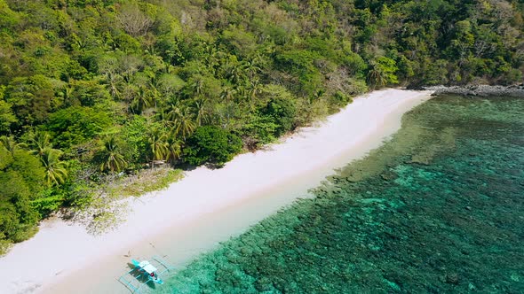 Remote White Sand Beach on Helicopter Island Philippines