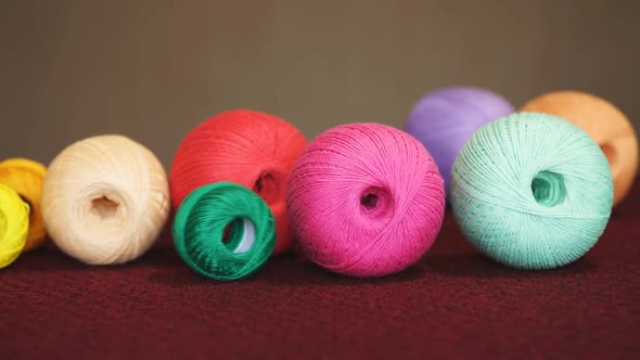 Clews Of Natural Wool On Table