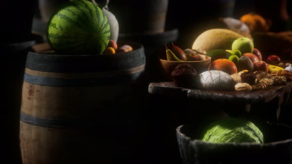 Food Table with Wine Barrels and Some Fruits Vegetables and Bread alt