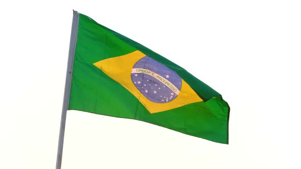 Brazil flag waving over white background.