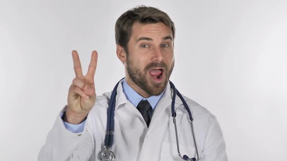 Portrait of Doctor Gesturing Victory Sign