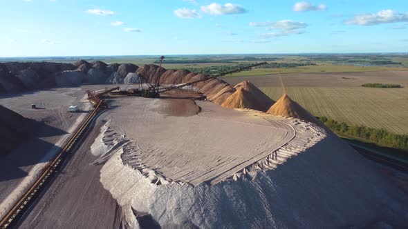 Conveyor in salt pits, mining of potash and salt, conveyor line in working process, salt quarries.