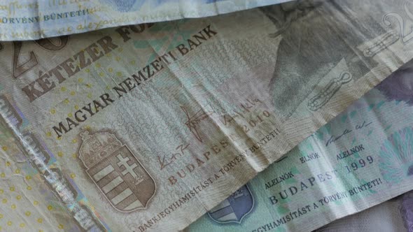 Hungarian Forints paper money background slow tilt 4K 2160p UltraHD video - Tilting on banknotes of 