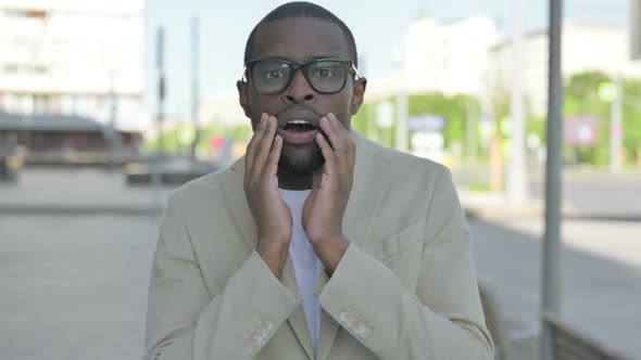 Disappointed African Man in Shock Outdoor