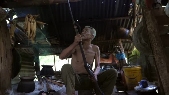 Asian The Elderly Man With Gun