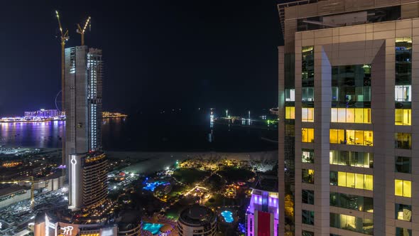 Aerial View of Modern Skyscrapers and Beach at Jumeirah Beach Residence JBR Night Timelapse in Dubai