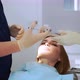 Dentist Gives an Analgesic Injection Into the Tooth of a Beautiful Woman - VideoHive Item for Sale
