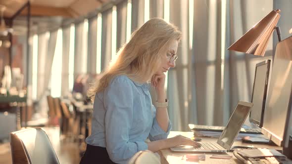 Businesswoman Booker Overworked Office At Deadline.Businesswoman Auditing Financial Statement Profit