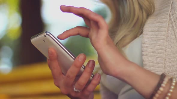Closeup of Young Woman Hands Typing Sms Scrolling Pictures Phone
