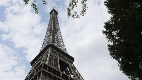 French Eiffel tower monument by the day located in Paris 4K 2160p 30fps UHD video - Beautiful steel 