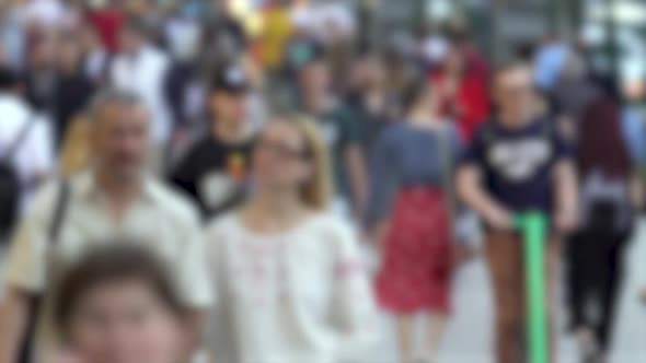 Silhouettes of People Walking in a Crowd Slow Motion