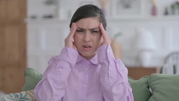 Portrait of Indian Woman having Headache