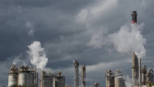 Industrial Chimneys Expelling Smoke