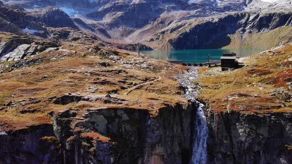 Picturesque View Of Waterfall Flowing From Lake Weisee In Austria - wide shot