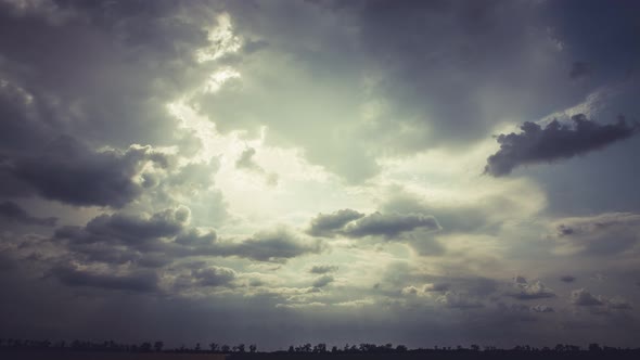 Dramatic And Cloudy Clouds Floating Across The Sky Over The Fields, Timelapse, 4k