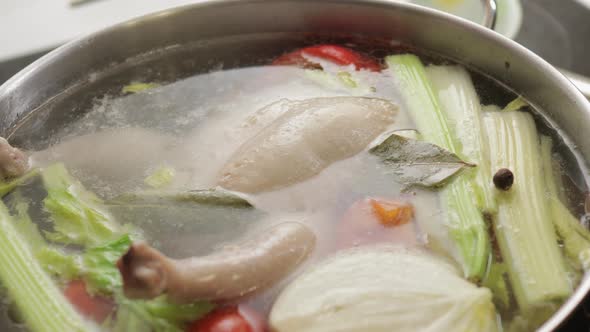  Chicken Broth with Vegetables Boiling in a Pot