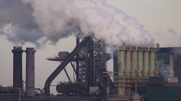 Aerial view of factory Tata Steel with smoking chimneys in Holland