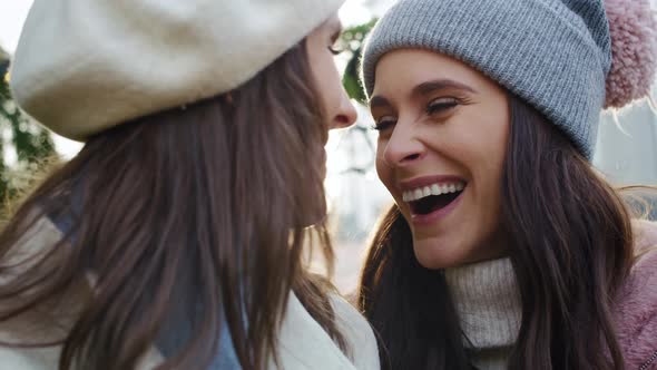 Video  of two female friends on Christmas time outdoors. Shot with RED helium camera in 8K.  