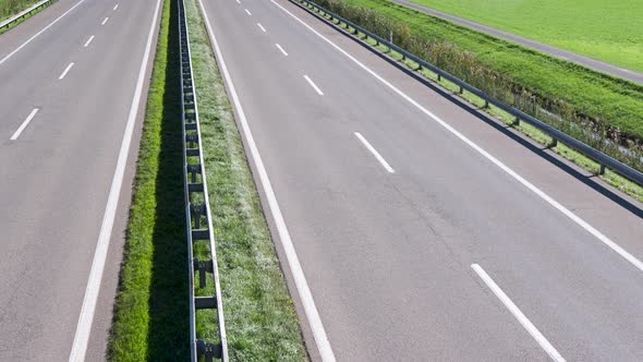 Vehicle on straight freeway drive to the horizon concept of ecological transport