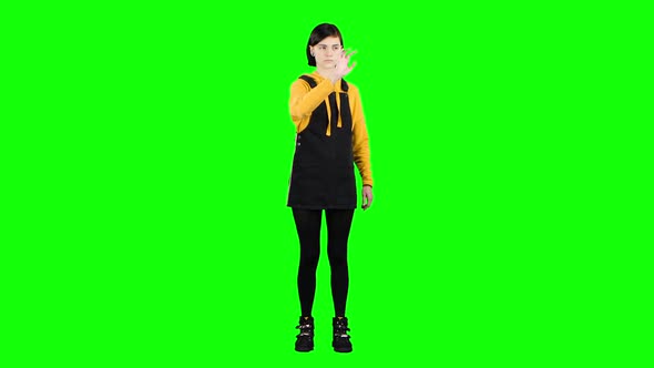 Teenager Virtually Draws a Drawing. Green Screen