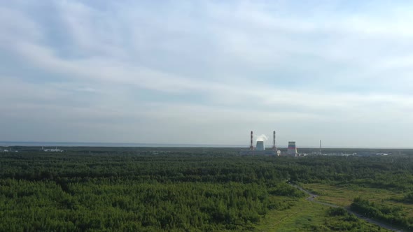 Smoking Cooling Pipes at Power Plant