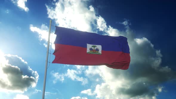 Flag of Haiti Waving at Wind Against Beautiful Blue Sky