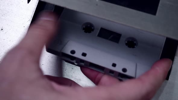 Audio cassette with retro tape player.