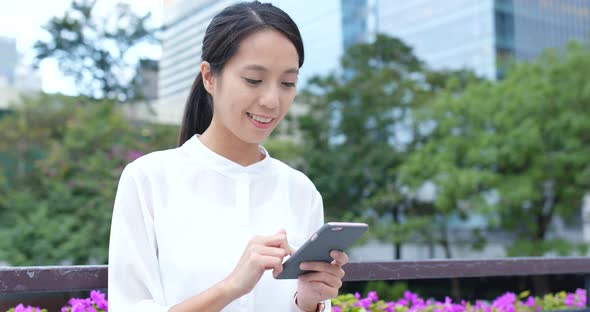 Businesswoman use of mobile phone