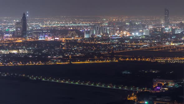 Aerial View to Creek and Zabeel District Night Timelapse with Traffic and Under Construction