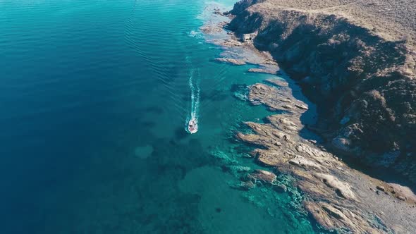 A fishing boat cruising through the sea.