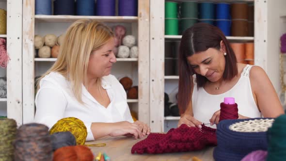 Happy Woman Learning How To Crochet with Knitting Instructor