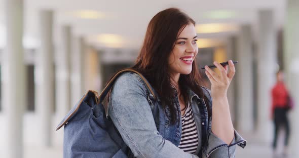 Young Caucasian woman on phone