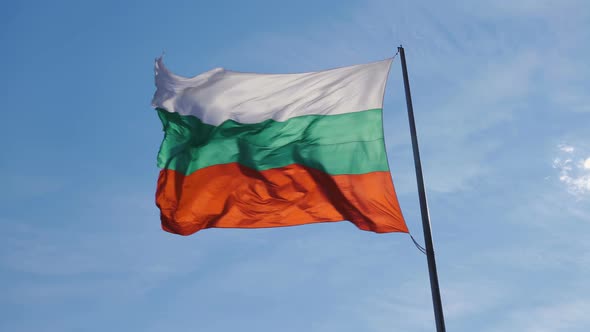 Bulgarian Flag Waving in Strong Wind Against Cloudy Sky