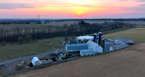 Large Amish farm in Lancaster County Pennsylvania. Aerial establishing shot of house and barn buildi