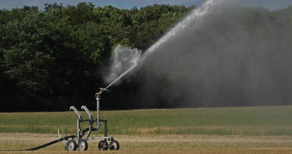 Sprinkler system Irrigating Field in the Loiret, France