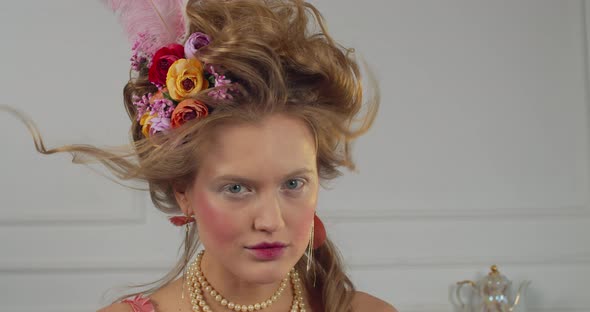 Portrait of a Young Pretty Woman with 18Th Century Makeup and Hairstyle