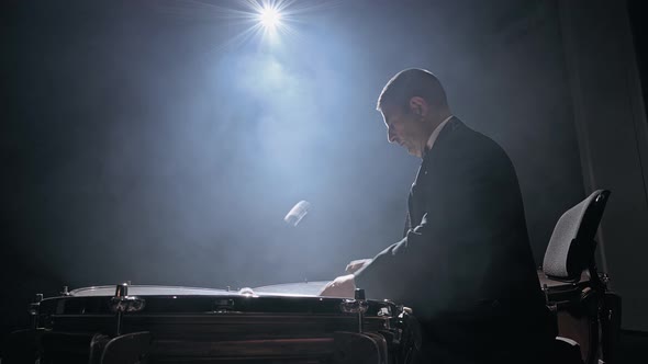 Musician Playing the Timpani