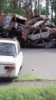 Vertical Video of the War in Ukraine  Destroyed Cars