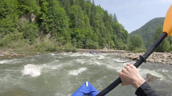 Extreme Rafting in Small Boats on Mountain River