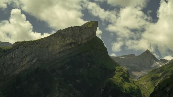 Time Lapse Clouds Float Over Mountain in Swiss Alps