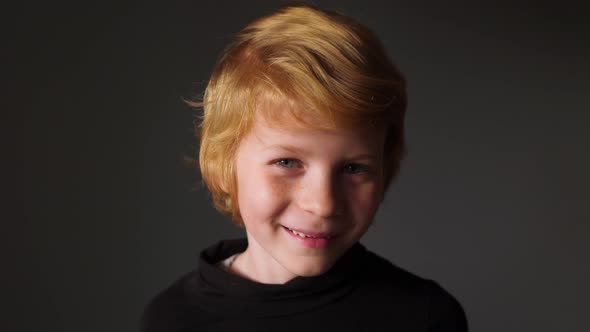 Portrait of young cute blonde boy