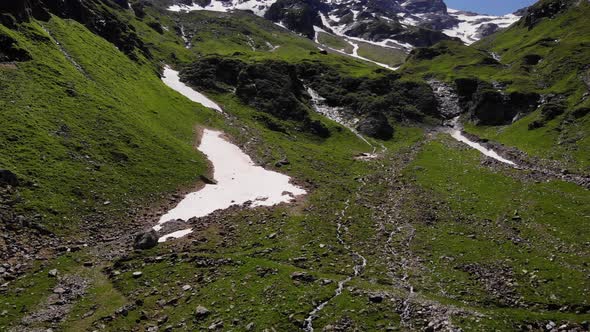 Glacial Stream Flows On The Mountains Of Hohe Tauern In Stausee Wasserfallboden, Kaprun Austria. - A